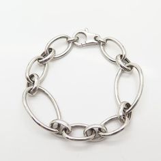 925 Sterling Silver Graduated Design Oval Link Bracelet 7"Weight: 14.0gWELCOME TO PAWN SHOPWe are an actual pawn shop and have been in business for over 25 years.Since 1990, our establishment has been serving a variety of clients by providing them with short term cash solutions and options of liquidity regarding their treasured heirlooms.Acknowledging that today′s customers are very sophisticated and are looking for a variety of investments, our acquisitions are hand-picked for our special clien Oval Link Chain Bracelet With Sterling Silver Clasp, Nickel-free Oval Link Sterling Silver Bracelet, Nickel-free Sterling Silver Link Bracelet, Nickel-free Sterling Silver Oval Link Bracelets, Adjustable Sterling Silver Bracelet With Lobster Clasp, Oval Link, Pawn Shop, Fabulous Jewelry, Hand Picked, 25 Years