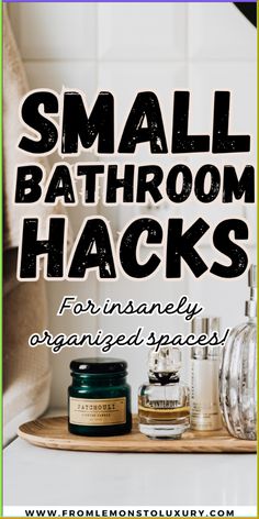 the words small bathroom hacks for organizing spaces on a wooden tray with jars and candles