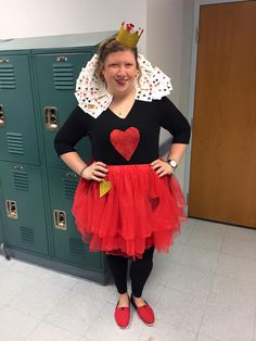 a woman standing in front of lockers wearing a red tutu skirt and heart shaped top