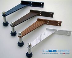 four different types of metal and wood furniture hardware on white background with clippings