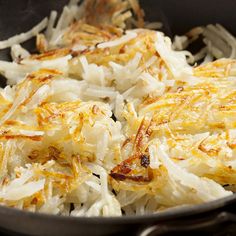 some food is being cooked in a skillet