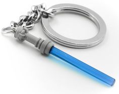 a blue light saber keychain with a metal ring on it's end