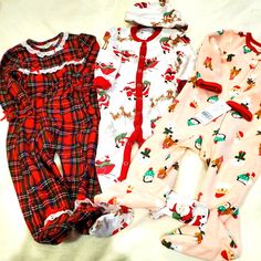 Great Condition- Toddler Holiday Pajamas 3 Different Items....Pottery Barn Santa Feetie Pajamas With Snaps And Adorable Matching Hat, Red Plaid Feetie Pajamas With Snaps And White Eyelet Lace And Brand New With Tags Carters Holiday Feetie Pajamas- Pink With Santa, Penguins And Reindeer On Them. All Super Soft And Cozy.....Pottery Barn 6-12 Months Carters And Red Plaid Pjs - 9 Months Family Matching Red Sleep Sets, Family Matching Sleep Sets In Red, Playful Red Sleep Sets, Playful Red Sleepwear Sets, Red Playful Sleepwear Sets, Red Family Matching Sets For Home, Red Family Matching Home Sets, Red Family Matching Bedtime Sets, Red Family Matching Sleepwear For Sleepover