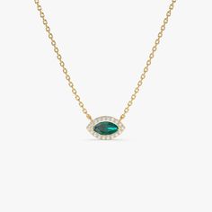 Enhance your style with our elegant 14K Gold May Birthstone Charm Necklace featuring a Marquise Emerald and Diamond pendant. This exquisite piece not only represents the beauty of May's birthstone but also carries a touch of good luck with its Evil Eye design. Make it a meaningful addition to your collection, by combining sophistication and symbolism in this Emerald Gemstone Necklace.  14K Gold Marquise Emerald Necklace, Diamond Accented May Birthstone Pendant, Evil Eye Good Luck Charm, Special Birthday Gift for Emerald Lovers. * Made to Order. * Gold Kt: 14K Solid Gold * Custom Gold Color: Rose Gold, Yellow Gold, White Gold * Width:8MM * Height: 5MM * Round Diamonds: 18pcs x 0.90MM * Marquise Emerald: 1pc x 6x3MM * Total Stone Weight:0.30ctw * Diamond Color-Clarity: G Color SI Clarity * S Elegant Marquise Birthstone Necklaces, Elegant Marquise Birthstone Necklace, Elegant Green Marquise Necklace, Elegant Turquoise Necklace With Diamond Accents, Elegant Turquoise Necklaces With Diamond Accents, Elegant Necklaces With Gemstone Accents For May Birthstone, Emerald And Diamond Necklace, Birthstone Charm Necklace, Emerald Style