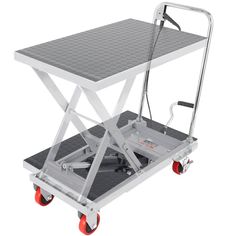 a dolly cart with a table on the top and two red wheels attached to it