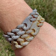 Premium 14k white gold OR 14k yellow gold plated diamond figaro cuban link Bracelet! -Plating is PVD which is the highest quality. -Stones are high quality VVS simulated lab diamonds(CZ)! Hand prong set and not glued in like the cheap ones! -Very nice box clasp! -16mm wide. -Comes in 7 or 8 inch. -Brass base metal. -Nice weight to it. Very solid piece. -Comes in gift box. FAST SHIPPING!*TRUSTED SELLER**4400+ SOLD* -NEW! -Very good quality bracelet. Looks even better in person. -For men and women Classic Cuban Link Bracelet With Cubic Zirconia, Classic Cuban Link Cubic Zirconia Bracelets, White Gold Cuban Link Bracelet With Vvs Clarity, Cubic Zirconia Curb Chain Bracelet Gift, Vvs Clarity White Gold Cuban Link Bracelet, Yellow Gold Iced Out Cuban Link Bracelet, Luxury Curb Chain Bracelet With Cubic Zirconia, Luxury Cubic Zirconia Bracelet With Curb Chain, Classic Cuban Link Bracelet With Cubic Zirconia For Gift