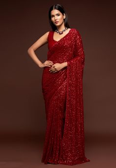 Red georgette saree with blouse 1010  Desc:  Color : Red Fabric : Georgette Work : Sequins   Thread Wash Care : Dry clean Sleeve Style : Sleeveless Long Sleeves : Done only in Custom Stitch Sleeves Lining : Done only in Custom Stitch Bust Size : 32 to 42 Inches Occasion : Sangeet   Party Wear   Engagement   Reception   Ceremonial   Baby Shower. With Express Free Shipping and Custom Stitching, Buy Indian Wedding Party Wear Saree Red georgette saree with blouse 1010 online in USA, UK and Canada fr Sequins Saree, Red Sari, Party Wear Sarees Online, Sequence Saree, Sequin Saree, Party Sarees, Party Wear Saree, Georgette Blouse, Party Kleidung