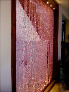 a door covered in lots of shiny beads