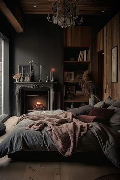 a bedroom with a bed, fireplace and window in the corner that has a chandelier hanging above it