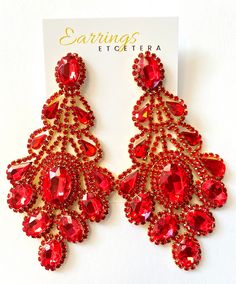 Gorgeous statement earrings that are sure to compliment your outfit.Choose from 4 beautiful colors.. Red Topaz, Your Outfit, Ornament Wreath, Statement Earrings, Beautiful Colors, Topaz, Red, Color