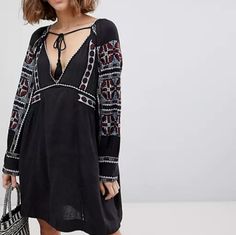 Womens Large Embroidered Trim Sheath Dress Brand New Whis Tag Pets And Smoke Free Home. Fast Shipping Black Long Sleeve Embroidered Beach Dress, Black Long Sleeve Dress With Embroidered Neckline, Black Bohemian Embroidered Dress With Geometric Pattern, Black Folk Style Beach Dress, Black Embroidered V-neck Mini Dress, Black Embroidered Dress With Geometric Patterns For Spring, Black Dress With Geometric Embroidery For Spring, Black Long Sleeve Folk Dress, Black Embroidered Long Sleeve Mini Dress