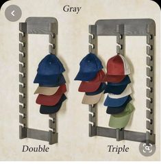 the hat rack has multiple hats hanging on it's sides and two hooks holding them