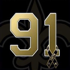 the number nine is shown in gold on a black background