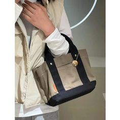 SPECIFICATIONSBrand Name: NoEnName_NullOrigin: Mainland ChinaCN: GuangdongLining Material: POLYESTERPlace Of Origin: GUANG DONG ProvincePlace Of Origin: GUANG DONG ProvinceShape: Casual ToteMain Material: CANVASStyle: CasualClosure Type: haspModel Number: Women High-quality Canvas BagPattern Type: SolidInterior: Interior Slot PocketGender: WOMENDecoration: noneExterior: noneHardness: SOFTType 1: Women High-quality Canvas BagType 2: Multi-divided Tote BagType 3: Student SchoolbagType 4: Portable HandbagType 5: Large Capacity Lunch Bucket BagChoice: yessemi_Choice: yes