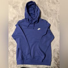 Brand New, Has Never Been Worn. In Color It Is Like A Purple Blue. Purple Fleece Hoodie Top, Casual Purple Fleece Top, Purple Fleece Sweatshirt With Drawstring Hood, Casual Purple Sweatshirt For Sports, Purple Nike Hoodie, Nike Tops Women, Purple Nikes, Neck Hoodie, Nike Hoodie