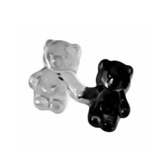 two black and white teddy bears sitting next to each other on a white background,