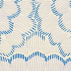 an abstract blue and white pattern on fabric