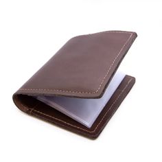 Style: BIWAL Classic Bi-fold Leather Wallet - No Window: This classic bifold leather wallet has a cash compartment, two card pockets open from the top with an extra pocket underneath, and on the other side three card pockets that are open from the side. Our American made bifold leather wallets could last you longer than any wallet you've ever owned.Features: Top Grain Leather Cash Compartment Three card pockets open from the side Two card pockets open from the top with extra pocket underneath Pl Classic Trifold Card Holder With Id Window, Formal Bifold Card Holder With Card Slots, Brown Trifold Wallet With Id Window For Business, Classic Trifold Wallet With Id Window, Classic Bifold Wallet With Card Slots, Classic Bifold Card Holder With Card Slots, Classic Bifold Card Holder With Slots, Classic Bifold Card Holder For Daily Use, Classic Bifold Card Holder With Interior Slots