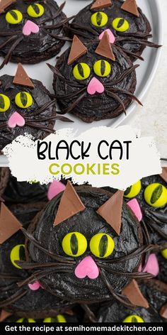 black cat cookies are decorated with chocolate and yellow eyes