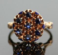 {Antique Victorian Sapphire Ring with Enamel Design} Blue Polished Enamel Ring, Blue Enamel Polished Round Ring, Blue Enamel Ring With Polished Finish, Sapphire Cluster Ring With 17 Jewels, Blue Round Sapphire Ring With Rose Cut Diamonds, Formal Blue Enamel Ring In 14k Gold, Blue 14k Gold Enamel Ring For Formal Events, Blue 14k Gold Enamel Ring For Formal Occasions, Hallmarked Sapphire Cluster Ring