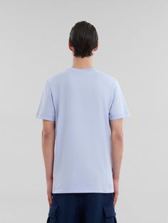 Short-sleeved crew-neck T-shirt made from organic cotton jersey. Regular fit. Mini Marni logo on the chest. Modern Blue Cotton T-shirt, Flat Heel Boots, Trunk Bag, Slides Sandals, Women Essentials, Lacing Sneakers, Boot Accessories, Market Bag, Cool Socks