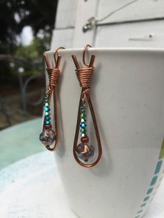 "Handcrafted copper and czech glass bead earring, approx 2.5\" long, but can be made shorter or longer. There are two finish variationsnon tarnish copper, or non tarnish silver over copper." Unique Beaded Dangle Earrings, Artisan Copper Beaded Earrings Nickel Free, Copper Beaded Dangle Earrings With Dangling Beads, Nickel Free Teardrop Copper Wire Earrings, Unique Copper Beaded Earrings Nickel Free, Copper Teardrop Dangle Earrings, Beaded Copper Dangle Earrings, Handmade Copper Beaded Dangle Earrings, Copper Dangle Earrings With Ear Wire