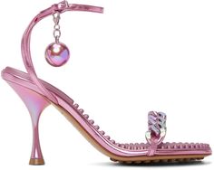 Nappa lambskin heeled sandals in pink. · Curb chain accent at vamp · Detachable spherical charm · Adjustable pin-buckle ankle strap · Logo-embossed textured rubber footbed · Covered stiletto heel · Leather sole with rubber injections · Heel: H3.5 in Supplier color: Azalea Betsey Johnson Heels, Bottega Veneta Sandals, Dress Reference, Shoes Closet, Nice Sandals, Pink Dot, Fashion Moodboard, Chris Martin, Pink Sandals