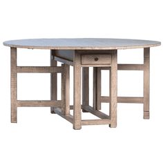 the table is made from wood and has two small tables on one side, with an oval