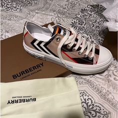 Burberry Activewear Sneaker Brown, Beige, Red, & Blue Size 91/2 Woman’s Brand New, Never Worn Luxury Casual Custom Sneakers In Patent Leather, Burberry Gym Shoes, Burberry Shoes Sneakers, Burberry Sneakers, Slip On Tennis Shoes, Burberry Plaid, Burberry Vintage, Leather High Tops, Print Sneakers