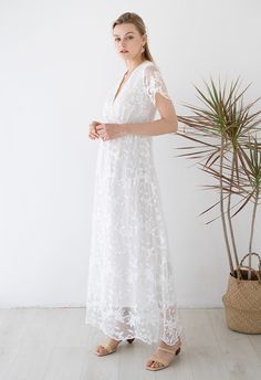 When a special event calls for a dress that outshines the rest, pick the floral embroidery mesh maxi dress! Featuring floral embroidery mesh, V-neck, short sleeves end up with scalloped cuffs and crochet trims at waist, the elegant dress is your best choice!    - Floral vine embroidery decorated  - V-neckline  - Short sleeves  - Scalloped cuffs and hemline  - Crochet trimming at waist  - Lined  - 100% Polyester  - Hand wash cold            Size  Length  Bust  Waist  Shoulder  Sleeves      XS  cm  141  90  70  37  16      inch  55.5  35.5  27.5  14.5  6      S  cm  142  94  74  39  17      inch  56  37  29  15.5  6.5      M  cm  143  98  78  41  18      inch  56  38.5  30.5  16  7            * Our model is 176 cm/5'9" tall and wearing size S Maxi Length Lace Dress With Floral Embroidery, Maxi Lace Dress With Floral Embroidery, Lace Maxi Dress With Floral Embroidery For Garden Party, Summer Sheer Lace Maxi Dress, Lace Maxi Dress With Floral Embroidery For Wedding, Garden Party Maxi Dress With Scalloped Lace, Scalloped Lace Maxi Dress For Garden Party, Spring Lace Maxi Dress Floor-length, Maxi Length Lace Dress For Garden Party