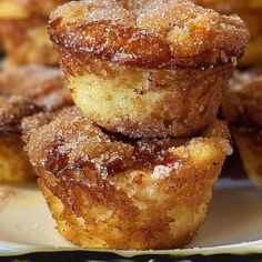 some sugary muffins stacked on top of each other