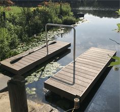 there are two wooden docks in the water