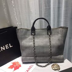 Description CC Deauville Tote Tweed Canvas Bag Fall/Winter Collection, Light Grey/ Dark Grey For Women 15in/38 cm Rep 1:1 Measurements: 38 x 30 x 18 cm / 15 x 11.5 x 7 inches (Length x Width x Height) Chain Light Grey/ Dark Grey Gold-toned hardware Include dust bag. This product is of the best quality. Designer Fall Tote Bags, Designer Tote Bags For Fall, Designer Double Handle Bags For Fall, Luxury Tote Bag For Winter, Luxury Tweed Shoulder Bag, Designer Bags For Everyday Use In Winter, Designer Tweed Bags For Everyday Use, Designer Tweed Shoulder Bag Rectangular, Classic Rectangular Tweed Shoulder Bag