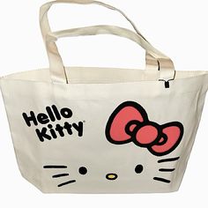 Nwot Hello Kitty Tote Canvas Shopper Bag. 100% Canvas Approx Size: 16 3/4”L X 11”H X 4”W Please Note That There May Be A Slight Color Variations On The Bow And Hk Whiskers, But Design Is As Pictured. Casual Rectangular Bag With Hello Kitty Print, Casual Hello Kitty Bags For Daily Use, Casual Pink Bag With Hello Kitty Print, White Hello Kitty Print Bag For Daily Use, Casual White Hello Kitty Shoulder Bag, Casual Rectangular Bags With Hello Kitty Print, Everyday White Hello Kitty Bag, Casual Hello Kitty Shoulder Bag For Daily Use, Casual Hello Kitty Everyday Bags