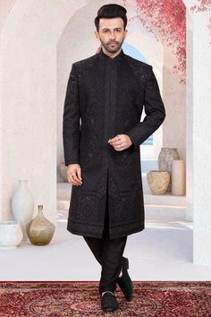 This exquisite mens sherwani is designed with intricate black bead embroidery, making it a must-have for grooms who want to make a bold statement on their special day. Perfectly blending traditional and modern styles, this sherwani exudes elegance and sophistication. Ideal for grooms who want to slay in black on their wedding day. Black Bead Embroidery, Sherwani Groom, Mens Sherwani, Bead Embroidery, Black Beads, Beaded Embroidery, Blending, Special Day, Must Haves