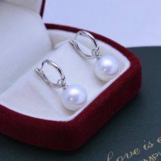 White 11-12mm Freshwater Pearl Earrings Stand out in these exquisite Freshwater Pearl & Classic Hoops Earrings. House of Pearls-JT crafted this perfect combination of 11-12mm Freshwater Pearl & Good Hoops Earrings and classic hoops for an elegant addition to your look. These earrings will be sure to bring that special sparkle to any outfit. Whether you're dressing up for an evening out or a casual day, these earrings are the perfect accessory for any occasion. Add this timeless piece to your col Earrings Stand, Popular Earrings, Earring Stand, Hoops Earrings, Hoop Earring Sets, Freshwater Pearls Earrings, Pearl Hoop Earrings, Pearl Types, Pearl Gemstone