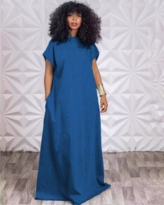 Casual Blue Solid Color Maxi Dress, Casual Solid Blue Maxi Dress, Casual Blue Maxi Dress Solid Color, Chic Blue Denim Maxi Dress, Blue Maxi Dress With Pockets, Dark Wash Denim V-neck Dress, Blue Maxi Dress With Pockets For Spring, Blue Denim Dress With Short Sleeves For Beach, V-neck Denim Dress For Beach