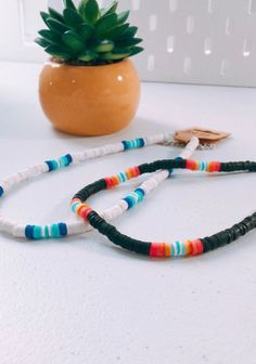 Super cute Hawaiian/beachy vibe necklaces Cheap Heishi Beads Necklaces For Vacation, Fun Multicolor Beaded Necklaces For Beach, Adjustable Turquoise Necklaces For Beach Season, Multicolor Everyday Jewelry For Summer, Multicolor Jewelry For Everyday Summer Wear, Summer Everyday Multicolor Jewelry, Black Necklaces As Summer Gifts, Black Necklace Summer Gift, Black Necklace For Summer Gift