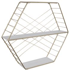 a white shelf with two shelves on each side and one shelf below it, in the shape of a hexagonal structure