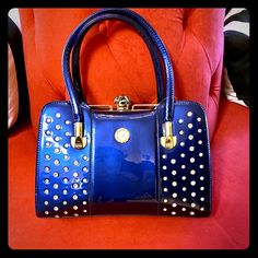 Very Sturdy Blue Patent Leather Handbag Embellished With White Or Clear Rhinestones That Are Surrounded By Gold Detail. The Clasp On The Bag Also Has Larger Rhinestones To Give It An Added Pop For The Hinge Opening Inside You’ll Find Zippered Pockets And Lots Of Storage Patent Leather Handbags, Lady Dior Bag, Clear Rhinestones, Blue Bags, Gold Details, Leather Handbag, Blue Gold, Size 13, Mini Bag