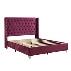 a purple bed frame with buttons on the headboard and foot board, in front of a white background