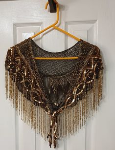 This item is a beautiful evening shawl with just enough sequins and shine to make your event perfect. It is a size small, though not noted on the garment. It has never been worn, but was previously owned. The colors are beautiful and the wrap is held closed by weighted tassels. Sequin Shawl, Beaded Shawl, Vintage Shawl, Evening Shawls, Beautiful Evening, Beaded Wraps, Historical Fashion, Shawls And Wraps, Scarf Wrap