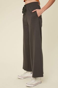 -Color: Charcoal -Wide leg cropped sweat pants -Cotton terry -Drawstring waistband -Side pockets -Wide leg -Content: 100% Cotton -Imported -Model is 5'10" 33-24-35 and wearing a size Small Wide Leg Joggers, Girl Sweat, Pants Cotton, Granola Girl, Line Store, Sweat Pants, Clothing Boutique, Drawstring Waistband, How To Feel Beautiful