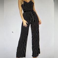 Cotton On Navy And White Jumpsuit. V Neckline And Sleeveless. Belt Included. Ptp Is 21 Inches And Length Is Approximately 56 Inches Material Is. 100% Viscose. Color Is Navy And White Striped. Fabric Care Is Machine Wash, Gentle Cycle And Hang To Dry. In Excellent Condition. Item 1111. Trendy Jumpsuits And Rompers For Date Night, Trendy Striped Fitted Jumpsuits And Rompers, Trendy Fitted Striped Jumpsuits And Rompers, Casual Spring Jumpsuits And Rompers For Night Out, Casual Spring Jumpsuits And Rompers For Date Night, Trendy Jumpsuits And Rompers For Date Night In Spring, Chic Striped Jumpsuits And Rompers For Work, Casual Striped V-neck Jumpsuits And Rompers, Striped Summer Jumpsuits And Rompers For Night Out