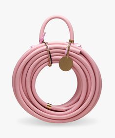 pink garden hose with brass fittings