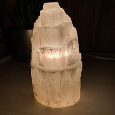 a large white rock sitting on top of a table