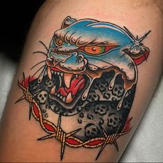 a tattoo with an image of a tiger on it