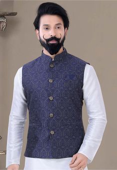 Art Silk Jacquard Nehru Jacket in Navy Blue This Readymade Chinese Collar Neck and Sleeveless attire is Enhanced with Buttons and Pockets Do note: Top, Bottom and Footwear shown in the image is for presentation purposes only. Half to one inch may vary in measurement. (Slight variation in actual color vs. image is possible) Nehru Jacket For Men, Navy Blue Print, Woven Art, Chinese Collar, Nehru Jacket, Utsav Fashion, Nehru Jackets, Collared Coat, Jacket For Men