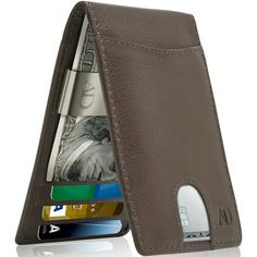 Introducing our newest slim money clip wallet for men. Handmade from the finest leather, our men's wallet comfortable carries all your cards and cash, yet remains extremely thin in your pocket. We designed this RFID wallet to hold 7 credit cards, and ID window, and with our extremely strong money clip, you will be able to fit a lot of cash in there. By adding a thumbhole to the exterior card slot, as well as one of the interior card slots, it allows you to easily remove and insert your 2 main cr Slim Wallet Men, Wallets For Men, Front Pocket Wallet, Mens Wallet, Rfid Wallet, Clip Wallet, Wallet Gifts, Pocket Wallet, Genuine Leather Wallets