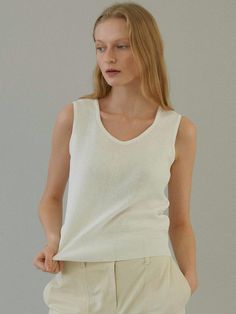 Composition : 52% cotton, 38% polyester, 10% nylonColor : fresh pink,off white,blackCountry of Origin : Republic of Korea Classic V-neck Knit Top For Summer, Beige Cotton V-neck Knit Top, Classic V-neck Spring Knit Top, Stretch Cotton Sweater Vest For Spring, Chic White Cotton Sweater Vest, Chic Spring Sweater Vest For Everyday, Elegant White Sweater Vest For Spring, Stretch Cotton Sleeveless Sweater Vest, Chic Cotton Sweater Vest For Work